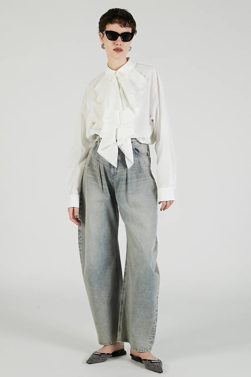 
                  
                    High-waisted Curved Denim
                  
                