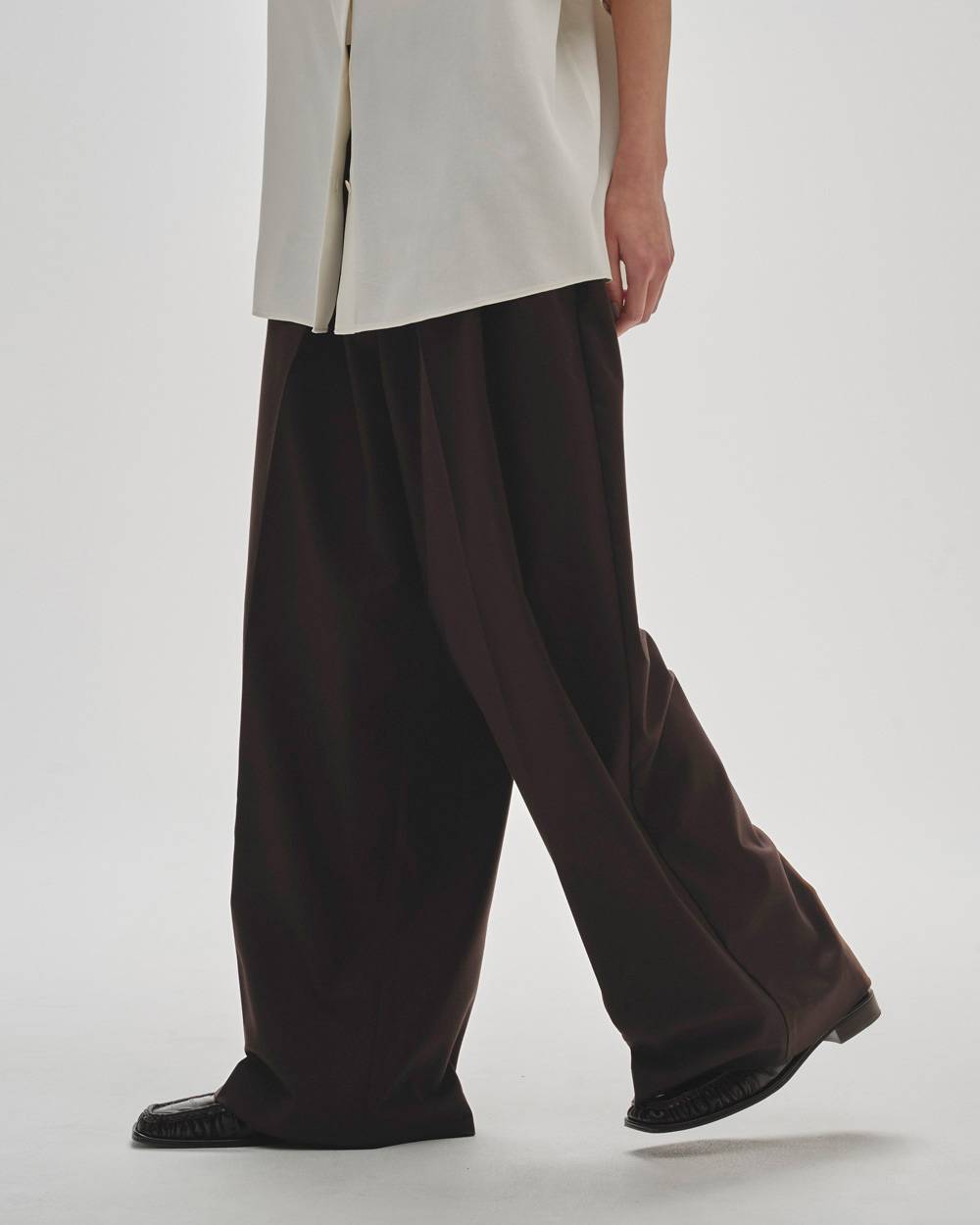 
                  
                    Lightweight Tuck Trousers
                  
                