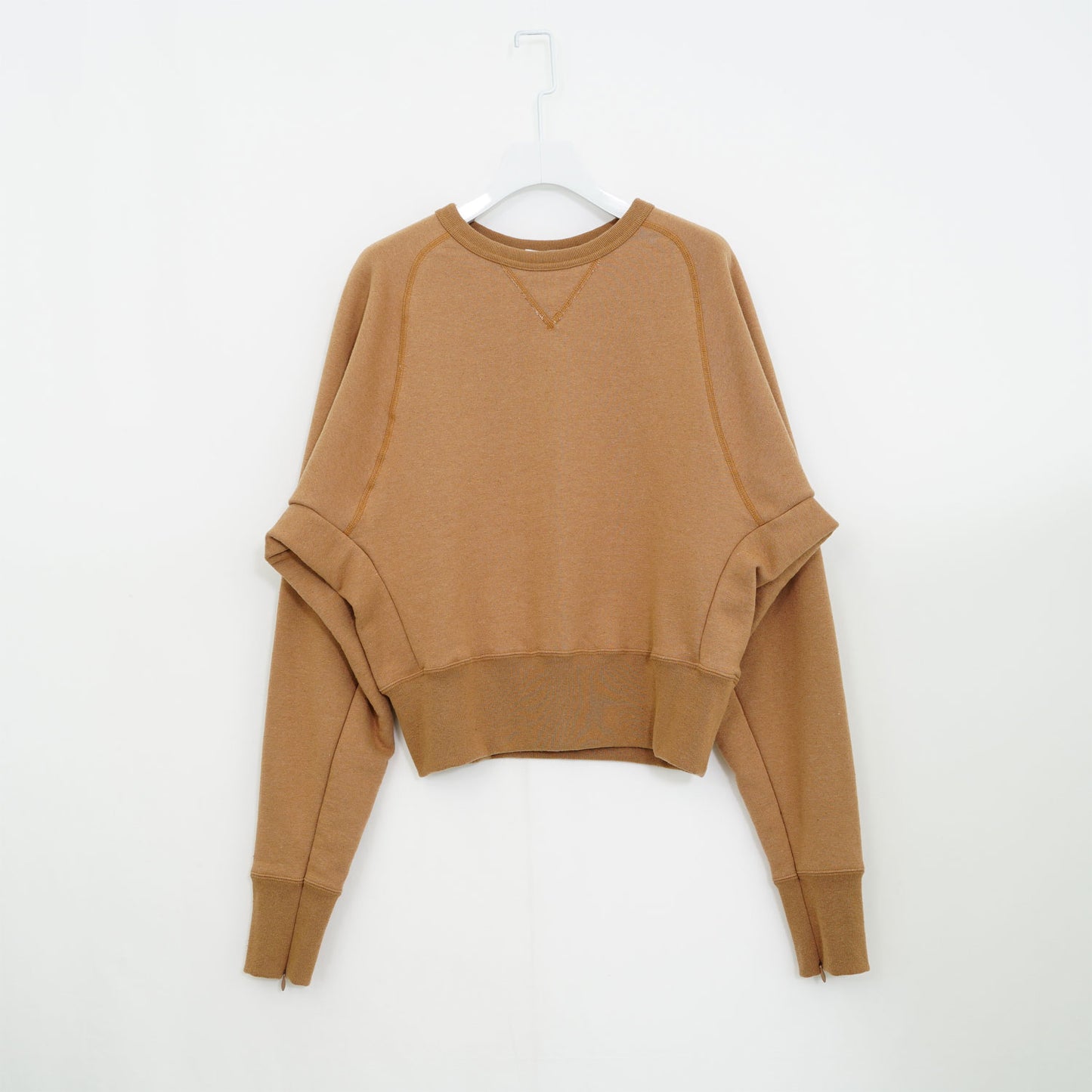 
                  
                    SLIT SLEEVE SWEAT-NATURAL BROWN-
                  
                