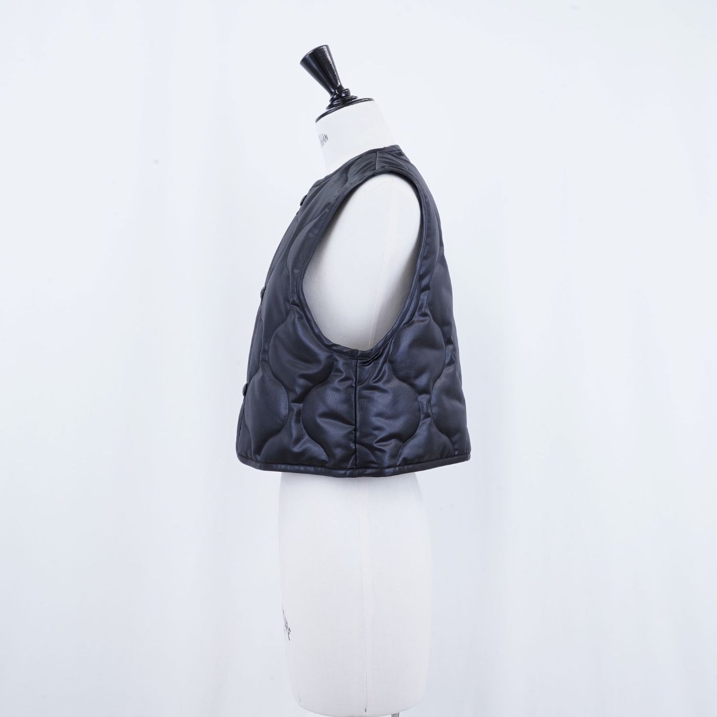 
                  
                    FAUX LEATHER QUILTED CROPPED VEST
                  
                