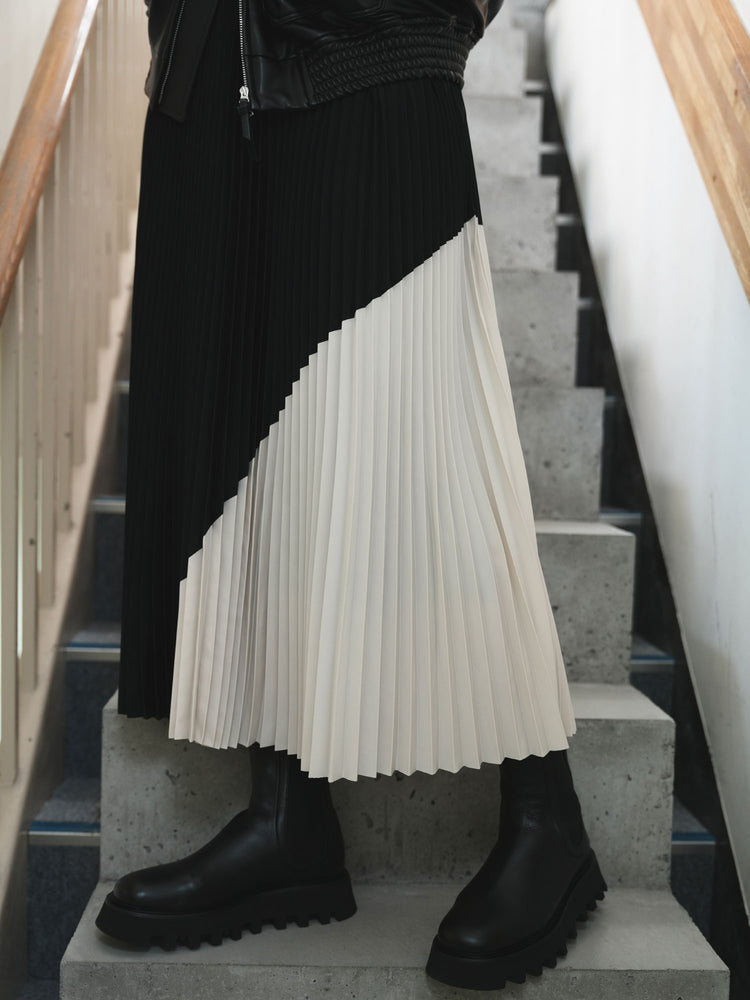 
                  
                    TAFFETA PLEATED PANELED SKIRT
                  
                