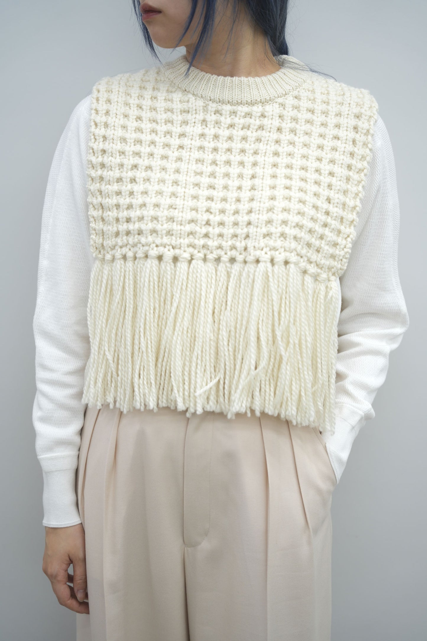 
                  
                    WAFFLE-KNIT SWEATER TOP W/FRINGE
                  
                