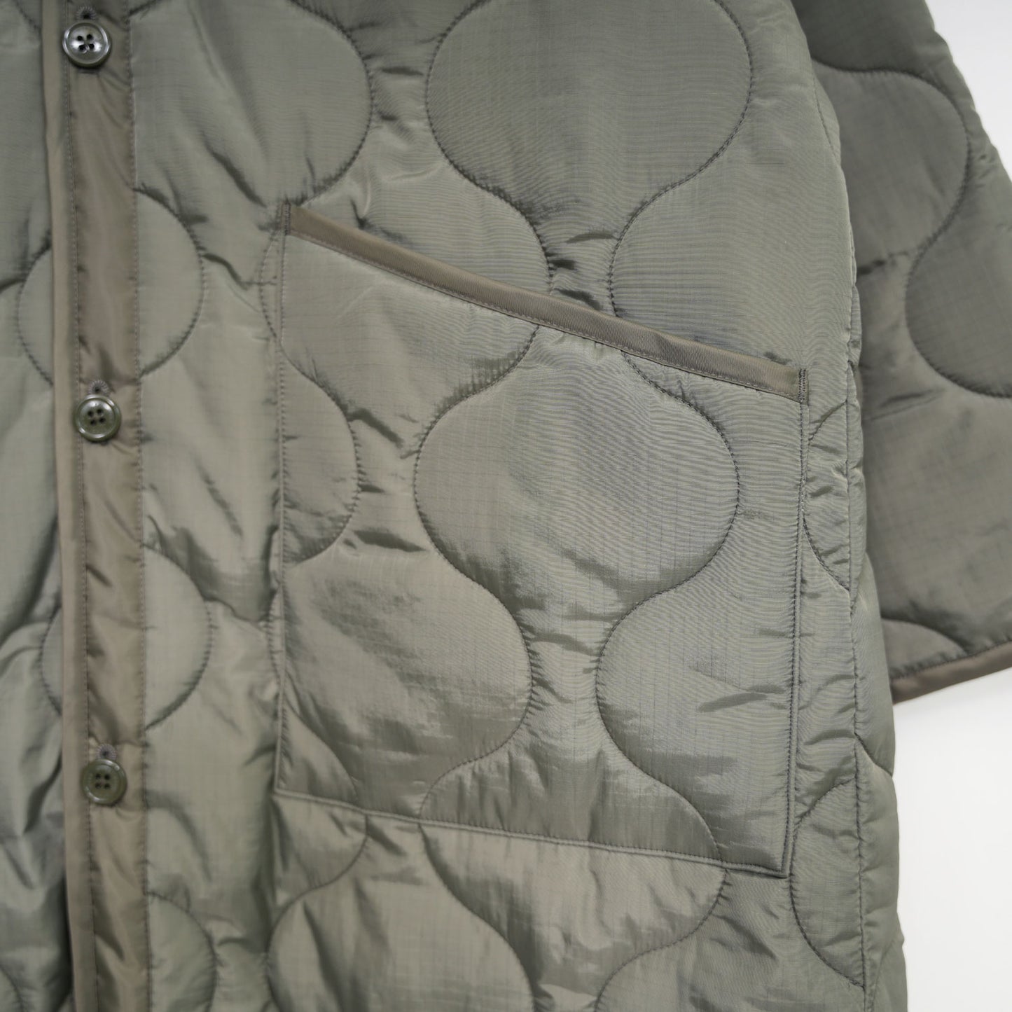 
                  
                    QUILTED LINER COAT
                  
                