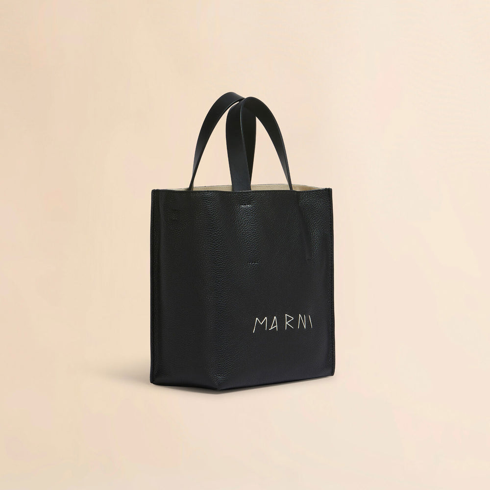 
                  
                    Museo Soft mini bag in black leather, Marni Mending
                  
                