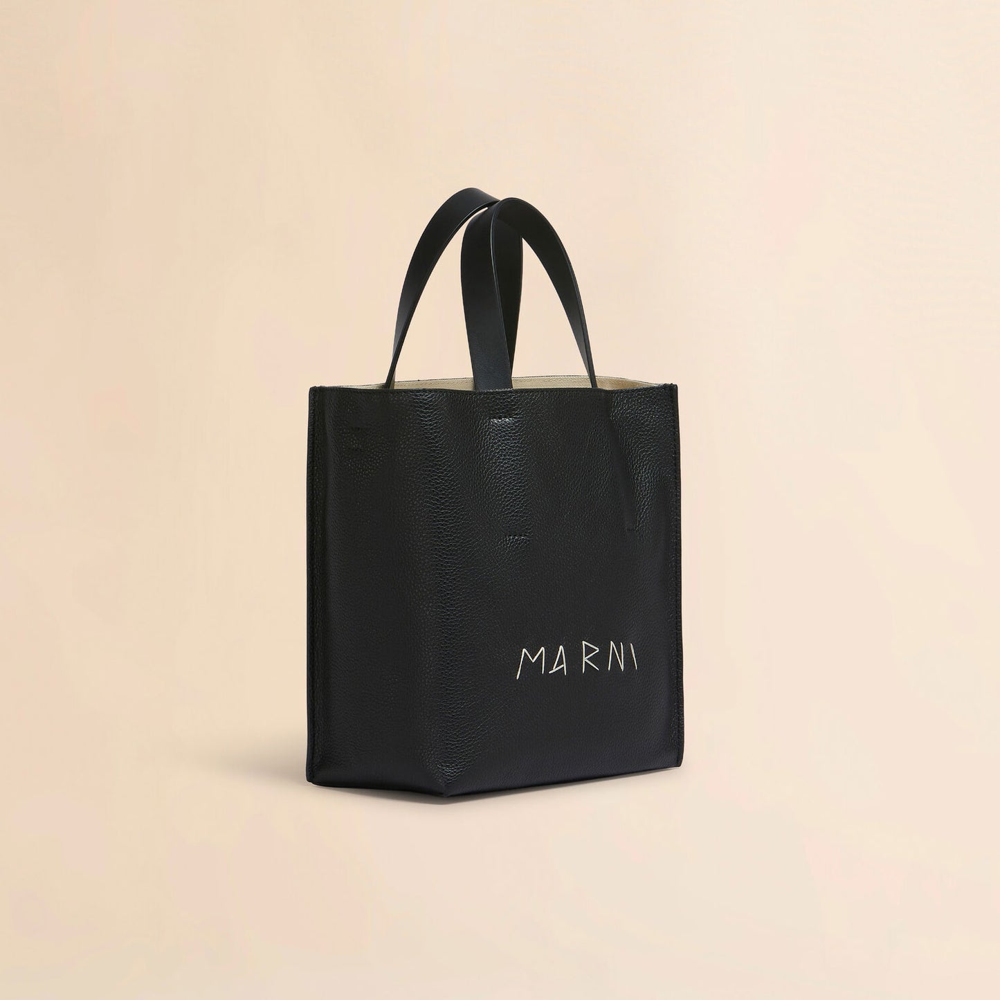 
                  
                    Museo Soft mini bag in black leather, Marni Mending
                  
                