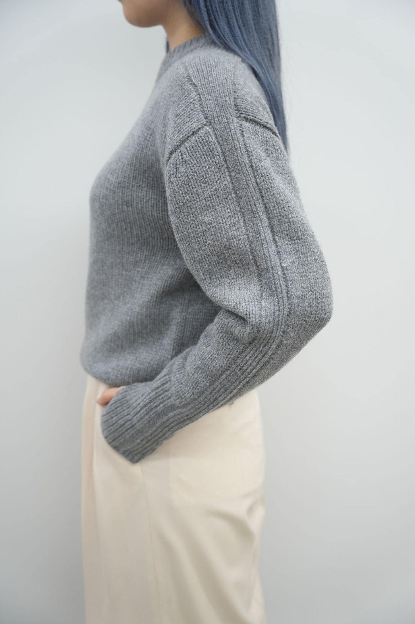 
                  
                    WOOL SWEATER
                  
                