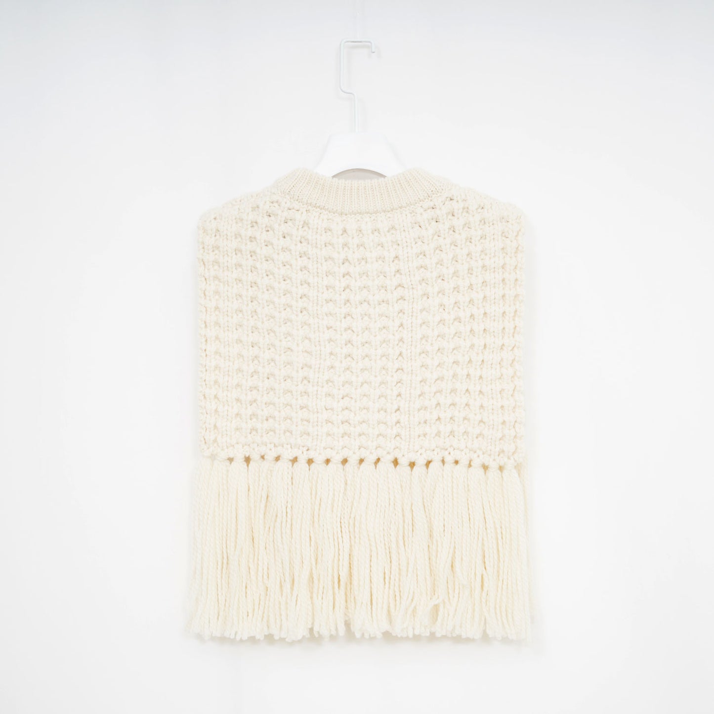 
                  
                    WAFFLE-KNIT SWEATER TOP W/FRINGE
                  
                