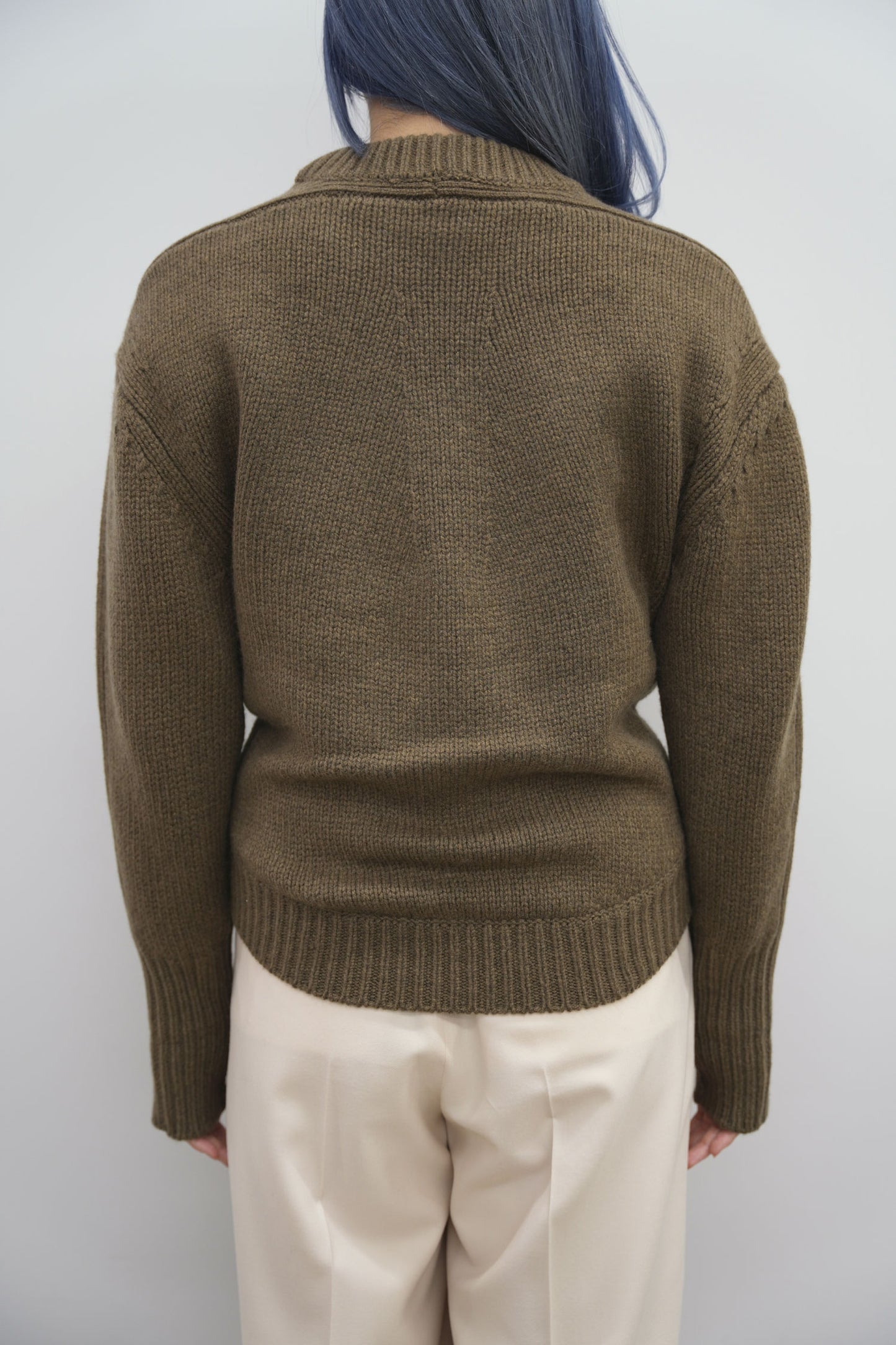 
                  
                    WOOL SWEATER
                  
                