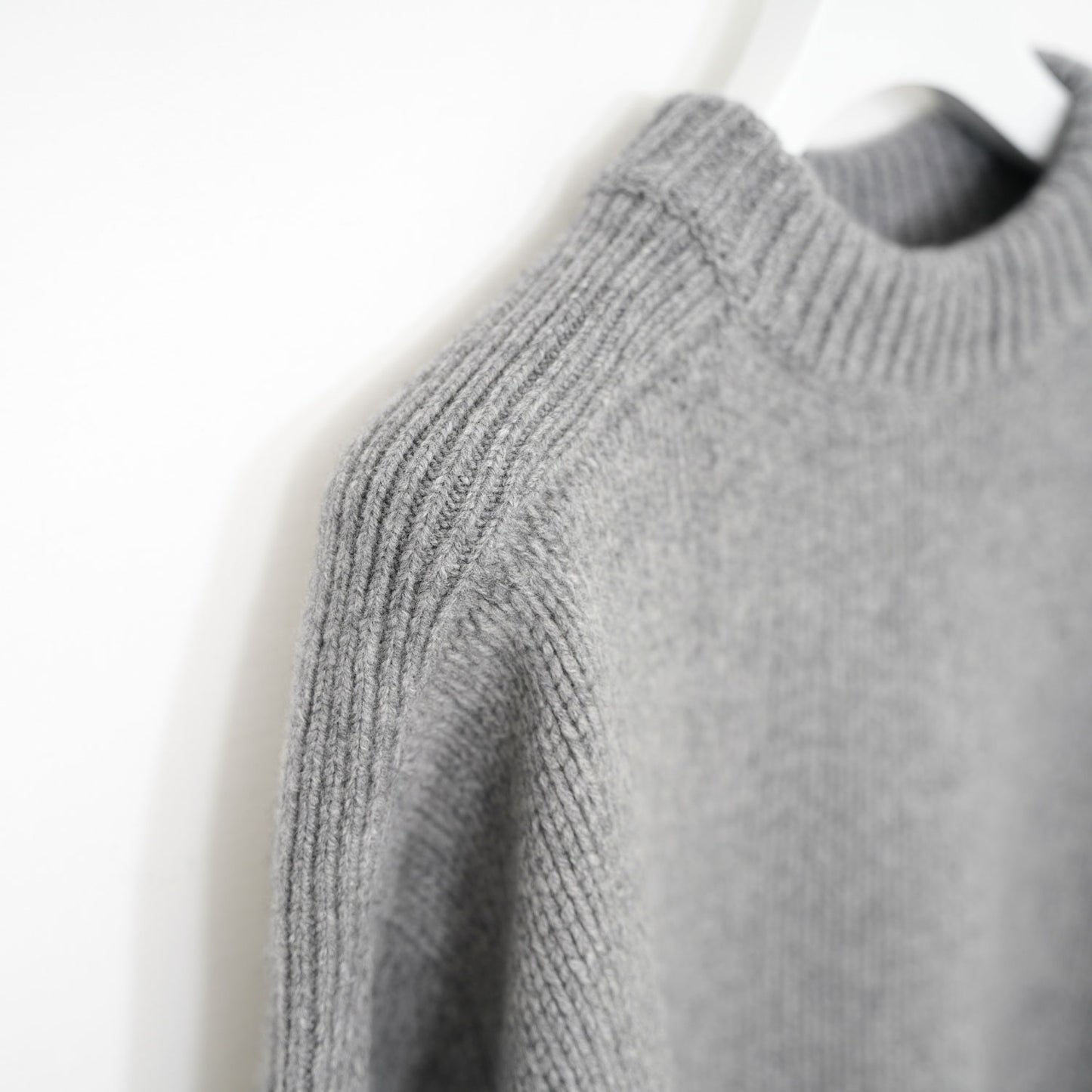 
                  
                    WOOL SWEATER
                  
                