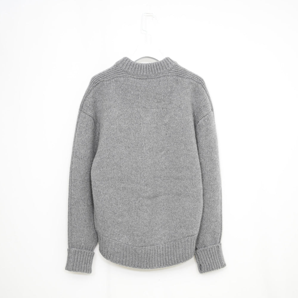 
                  
                    WOOL SWEATER
                  
                