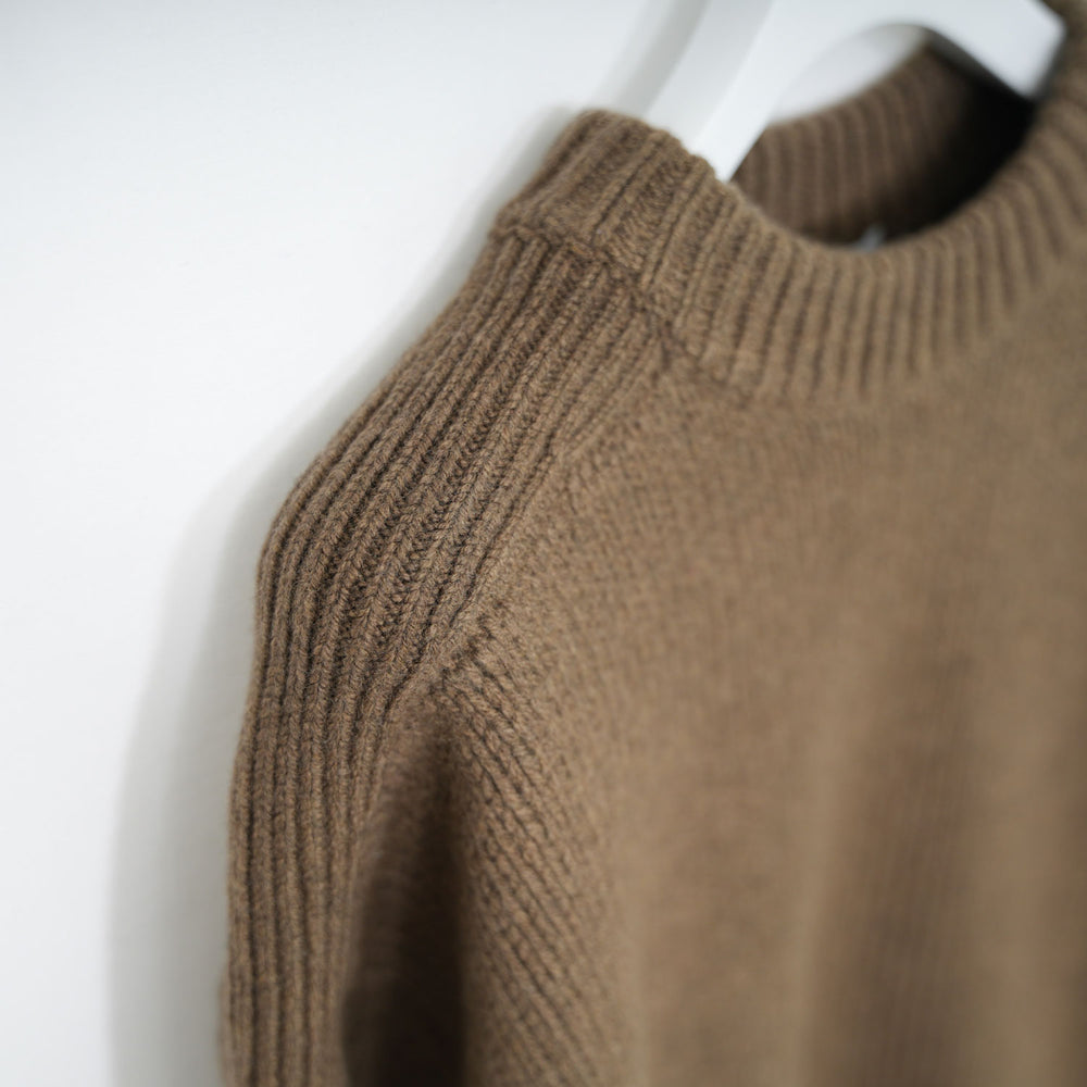 
                  
                    WOOL SWEATER
                  
                