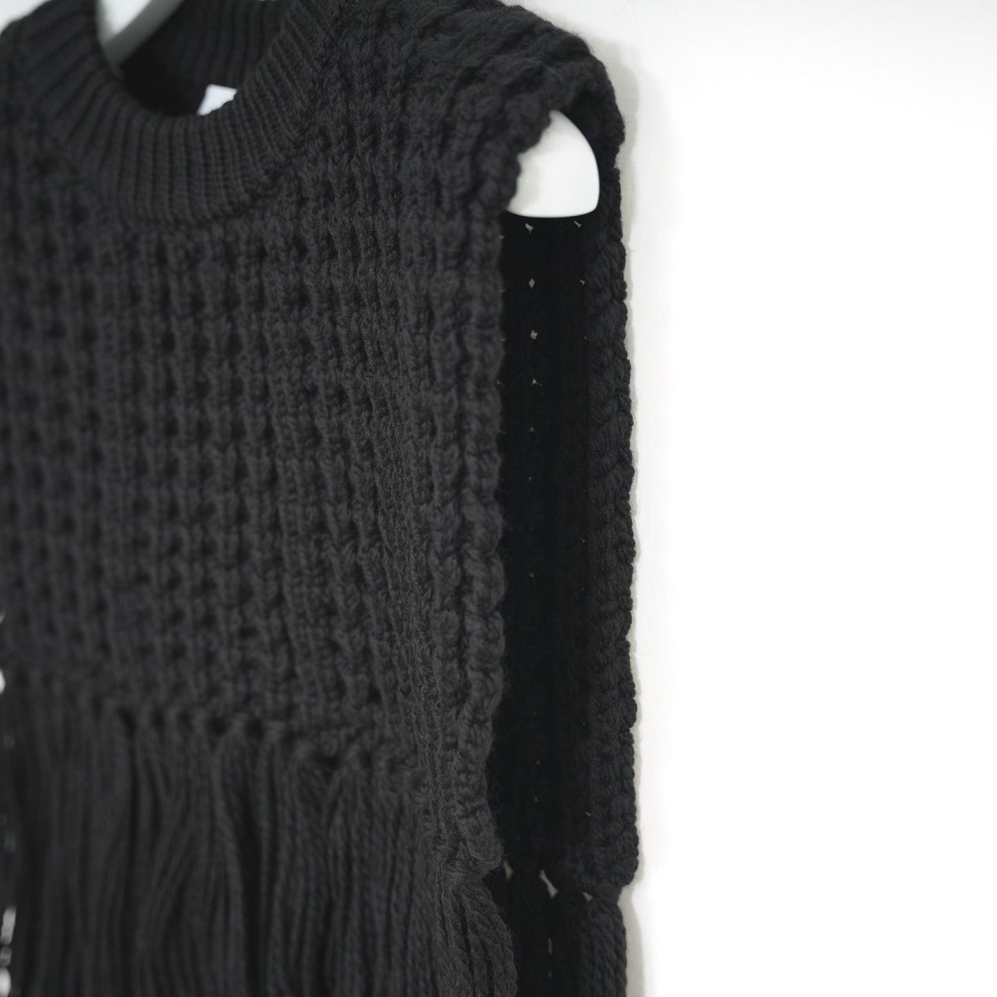 
                  
                    WAFFLE-KNIT SWEATER TOP W/FRINGE
                  
                