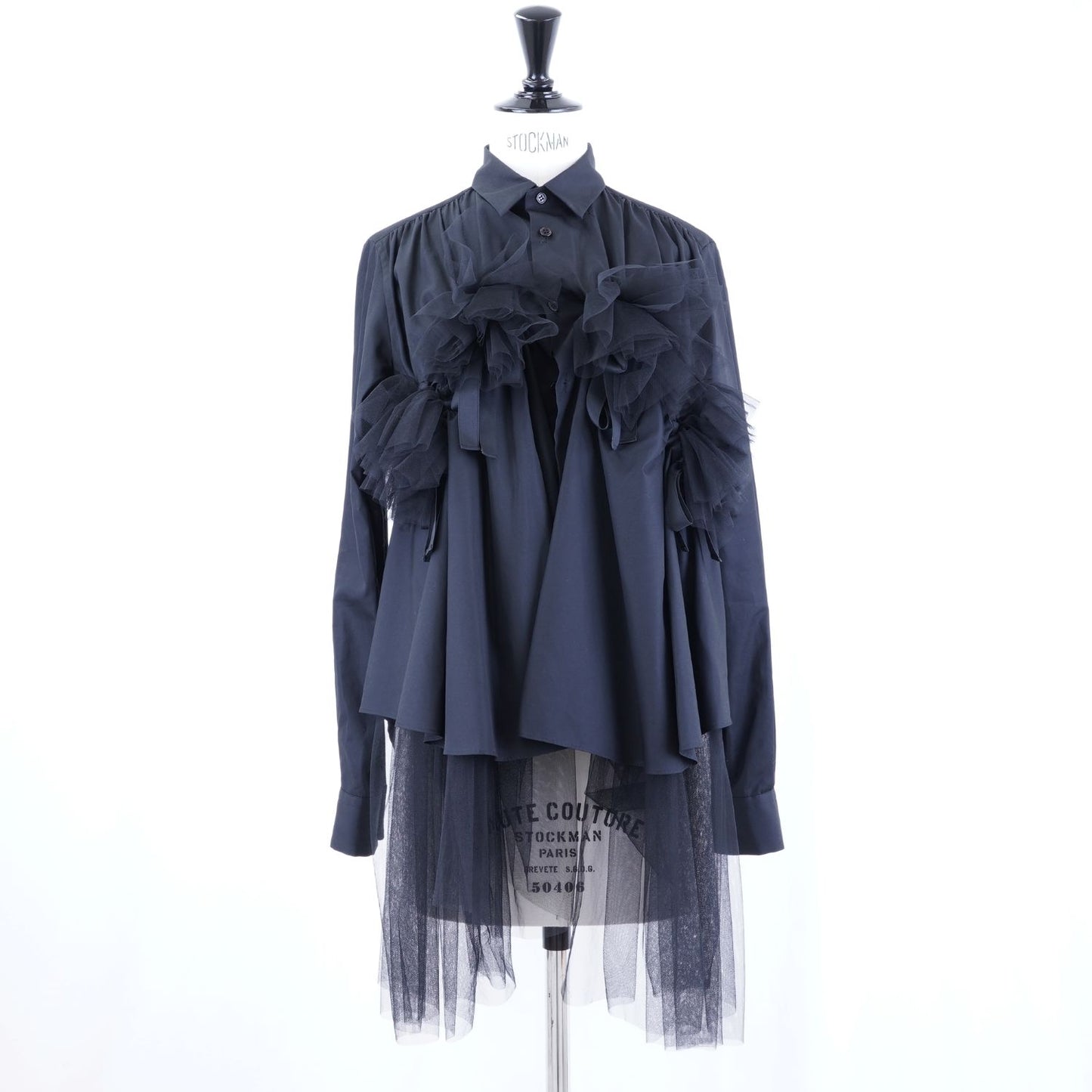 
                  
                    Tulle-docked shirt
                  
                