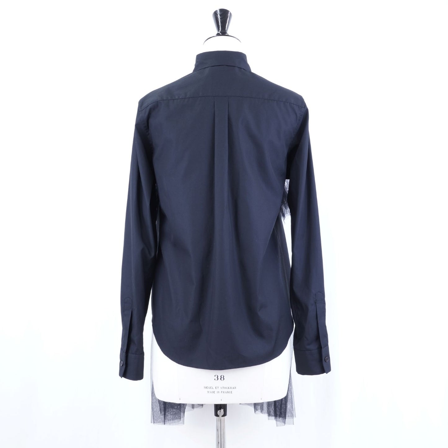 
                  
                    Tulle-docked shirt
                  
                