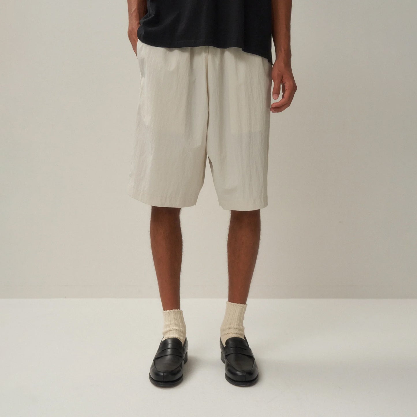 
                  
                    TRAVEL NYLON WIDE EASY SHORTS
                  
                