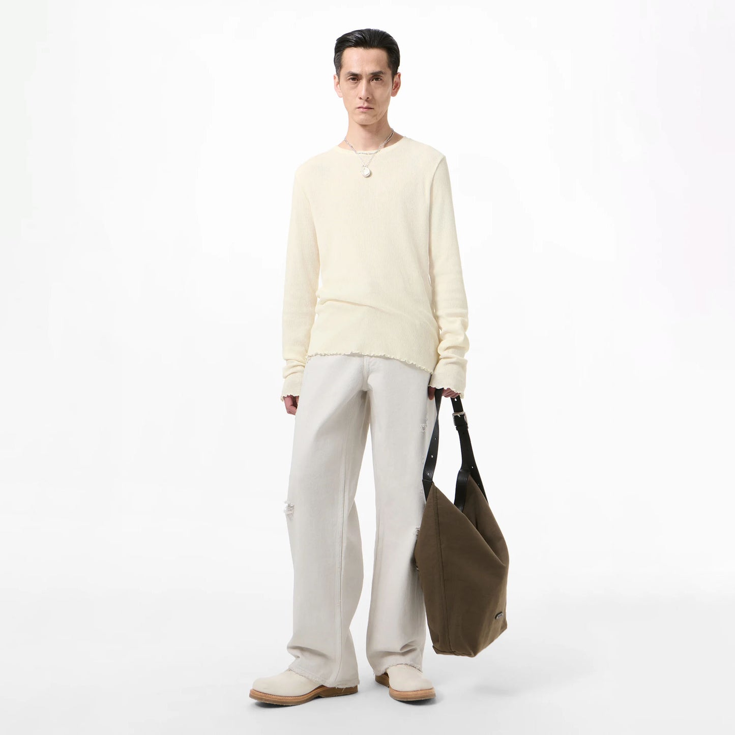 
                  
                    ELONGATED LONGSLEEVE
                  
                