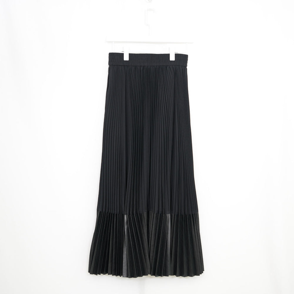 
                  
                    TAFFETA X ECO-LEATHER PLEATED SKIRT
                  
                