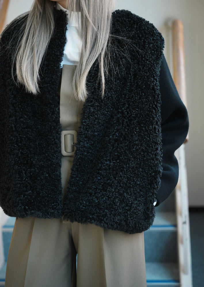 
                  
                    FAUX SHEARLING JACKET
                  
                