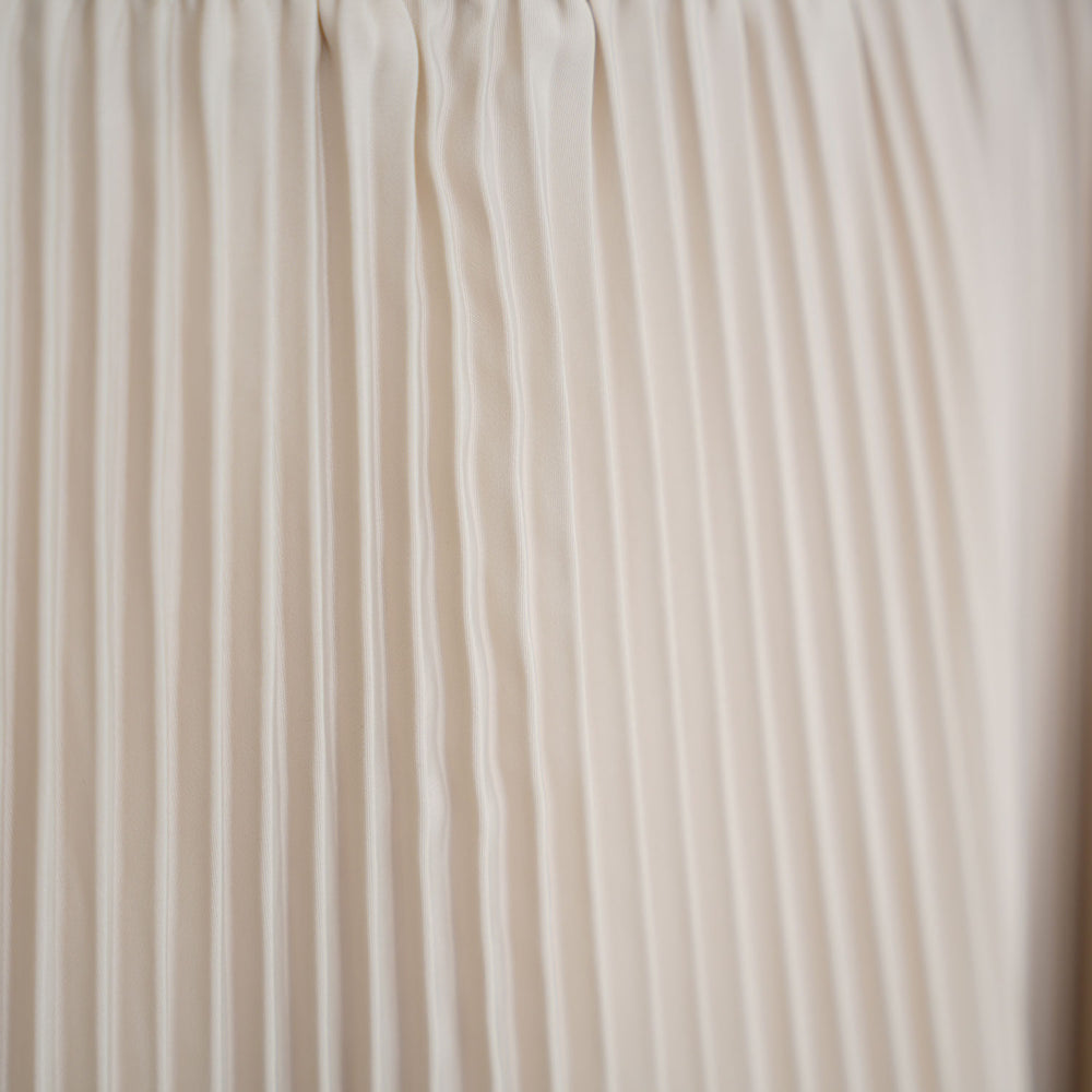 
                  
                    TAFFETA X ECO-LEATHER PLEATED SKIRT
                  
                