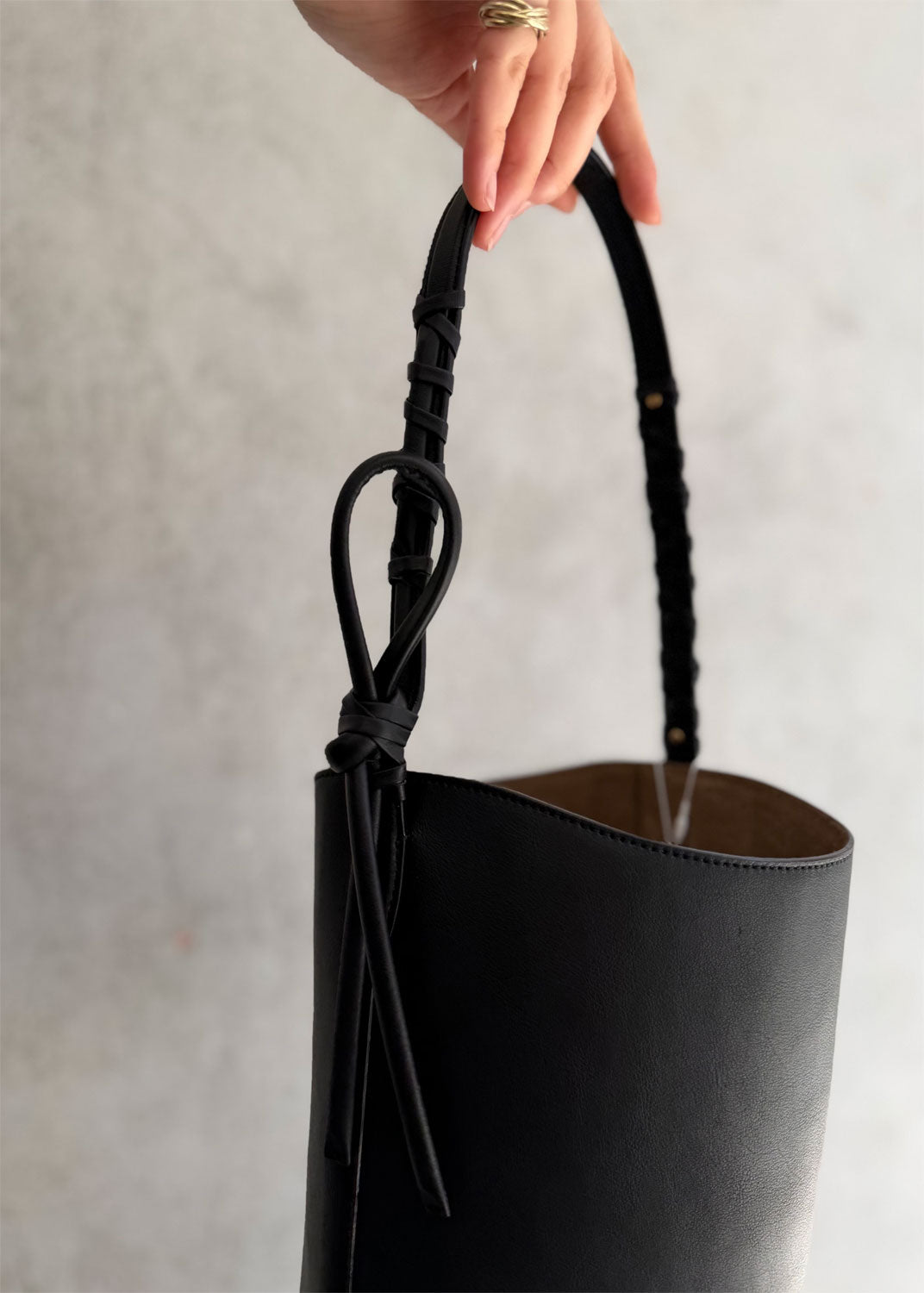 
                  
                    Mame Kurogouchi with Tsuchiya Kaban Small Mayu Bucket Bag - black
                  
                