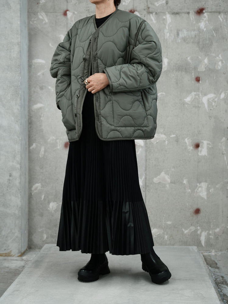 
                  
                    TAFFETA X ECO-LEATHER PLEATED SKIRT
                  
                