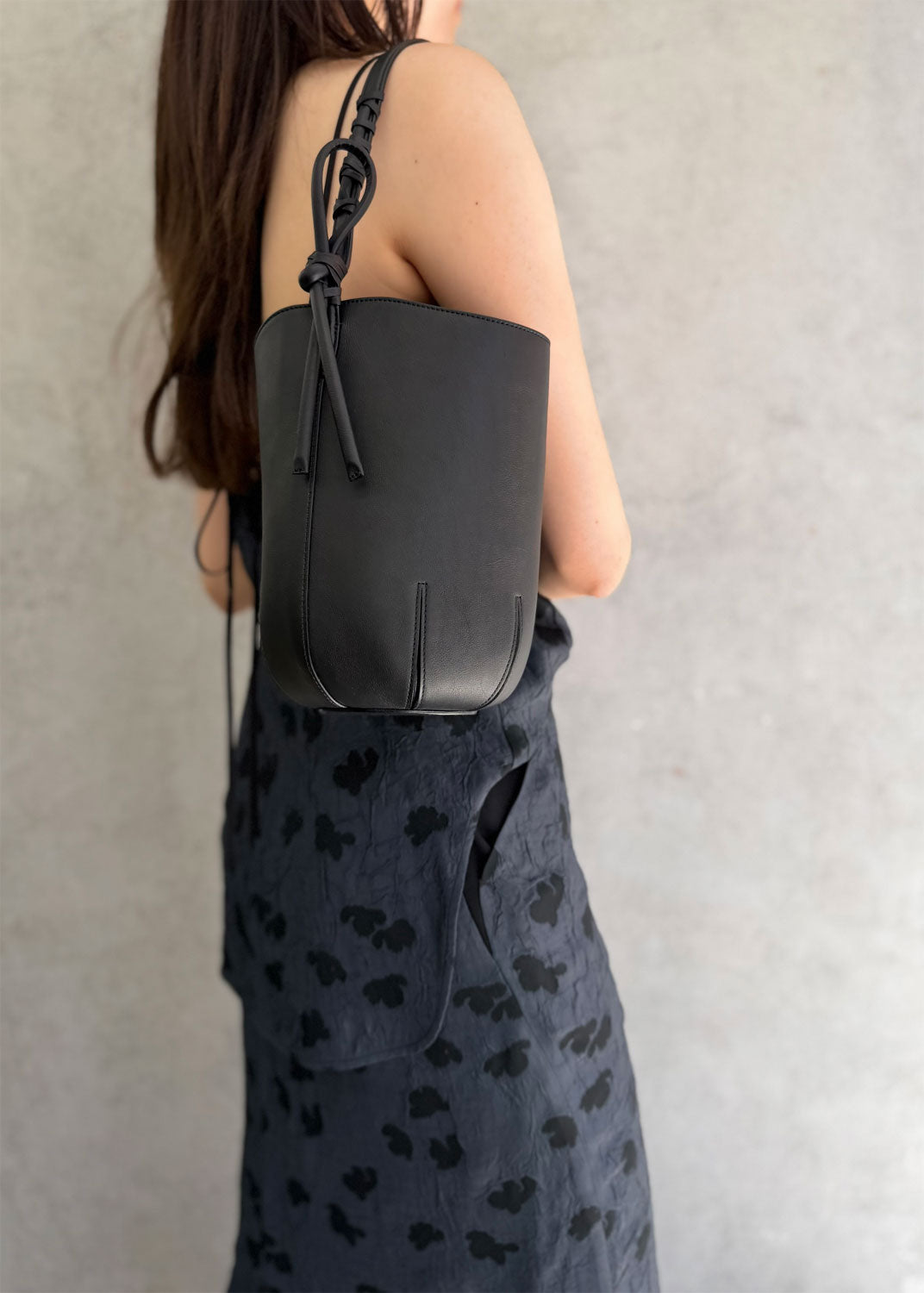 
                  
                    Mame Kurogouchi with Tsuchiya Kaban Small Mayu Bucket Bag - black
                  
                