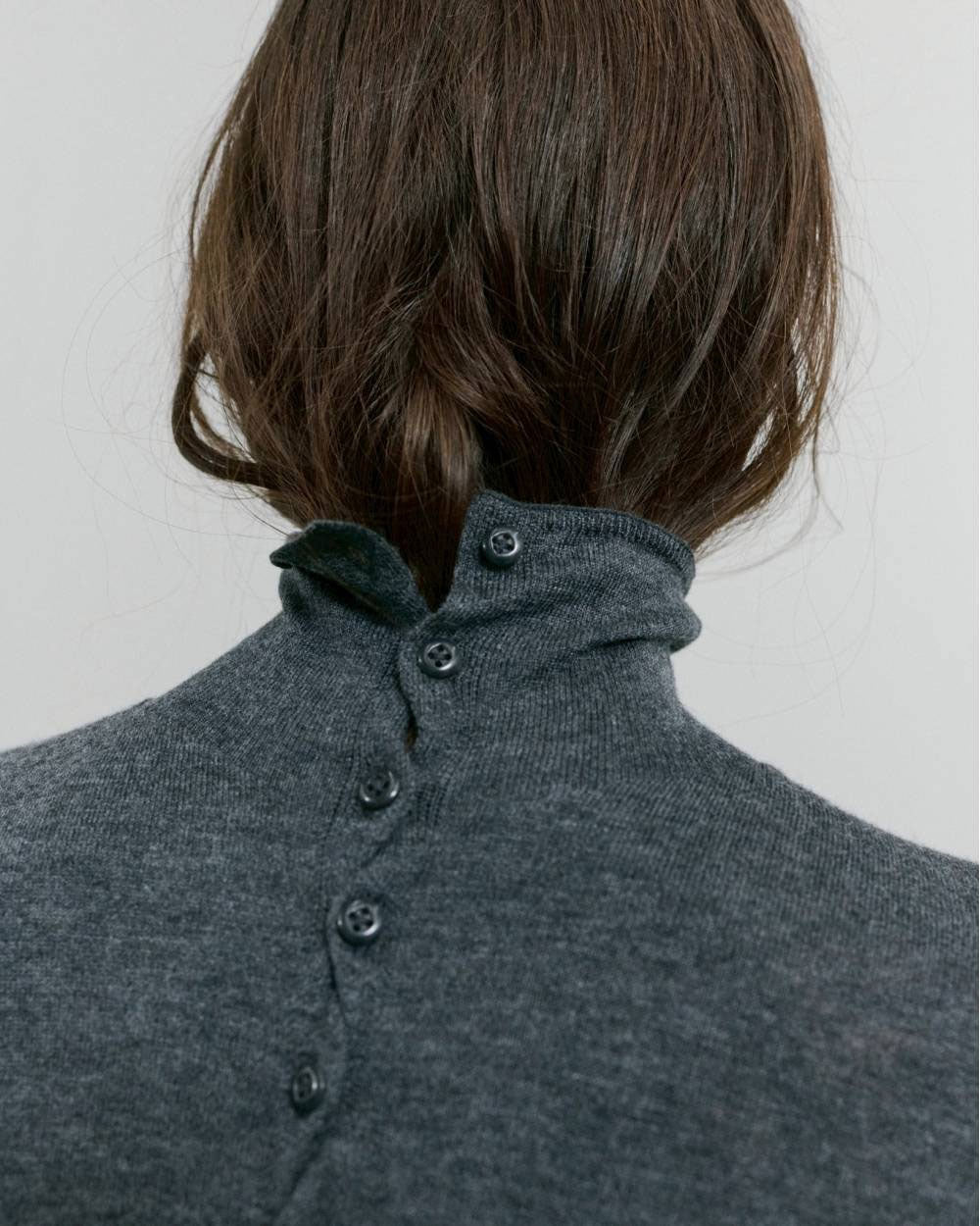 
                  
                    Turtleneck Button Knit
                  
                