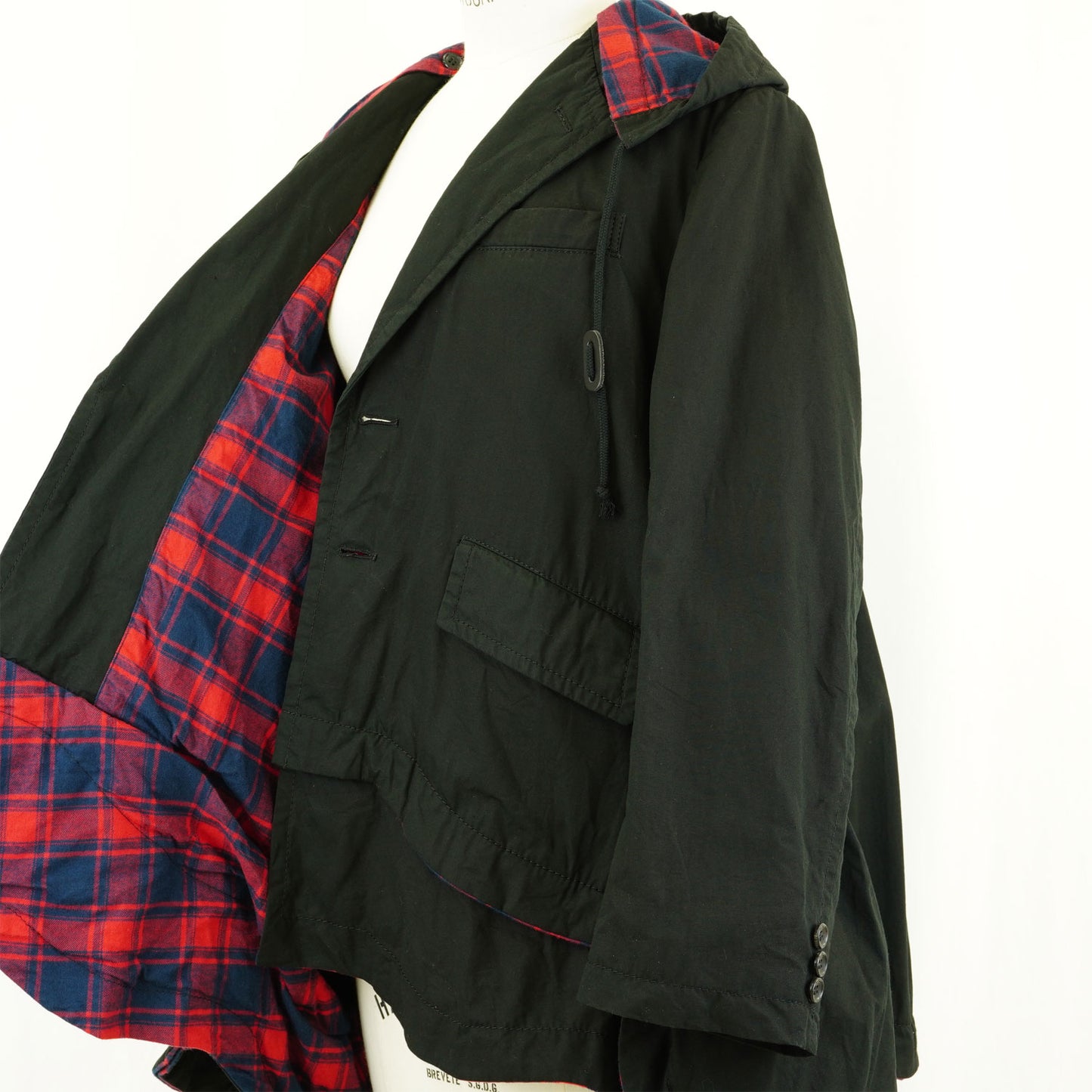 
                  
                    A-line oversized hooded jacket
                  
                
