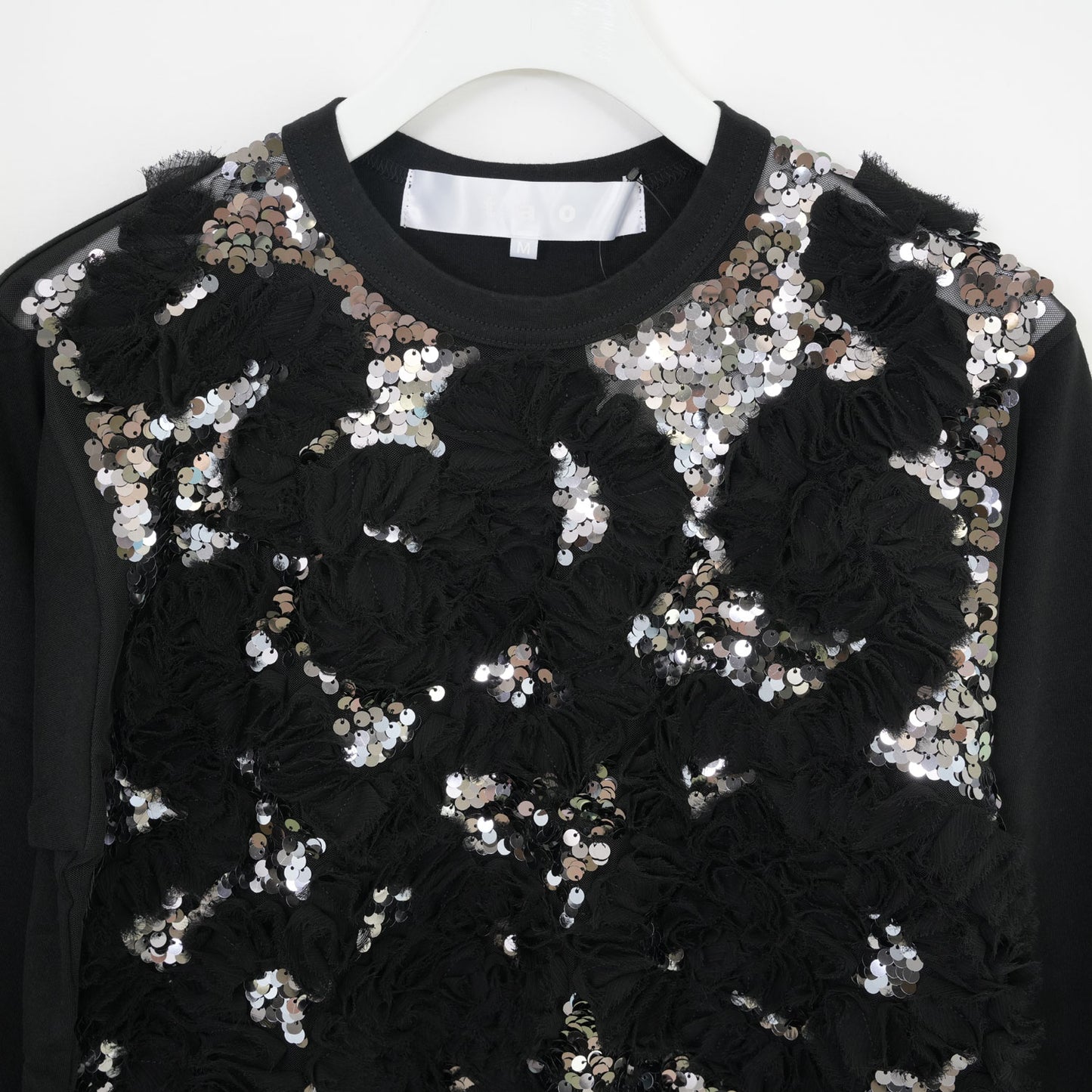 
                  
                    チュール刺繍カットソー-BLACK×SILVER-
                  
                