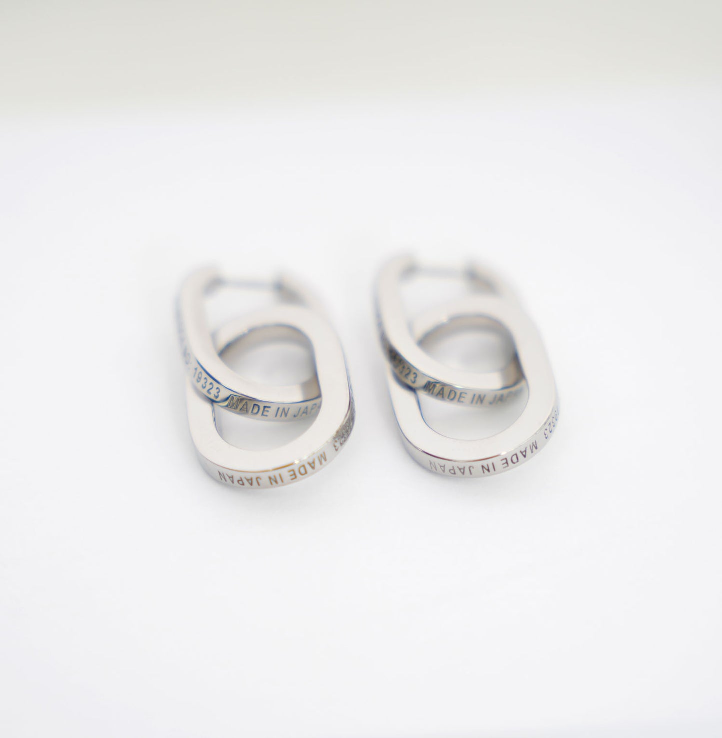 
                  
                    DOUBLE OVAL EARRINGS
                  
                