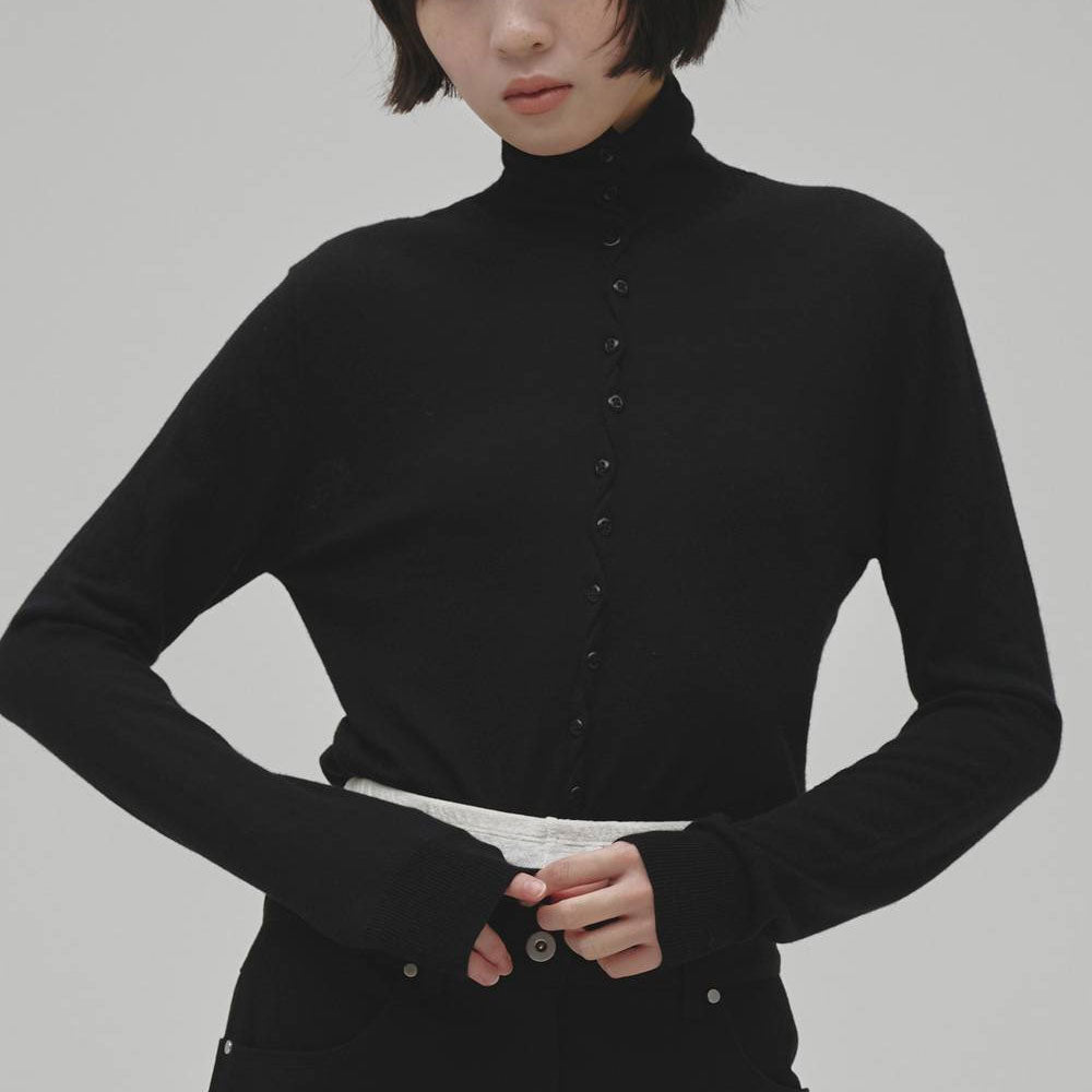 
                  
                    Turtleneck Button Knit
                  
                
