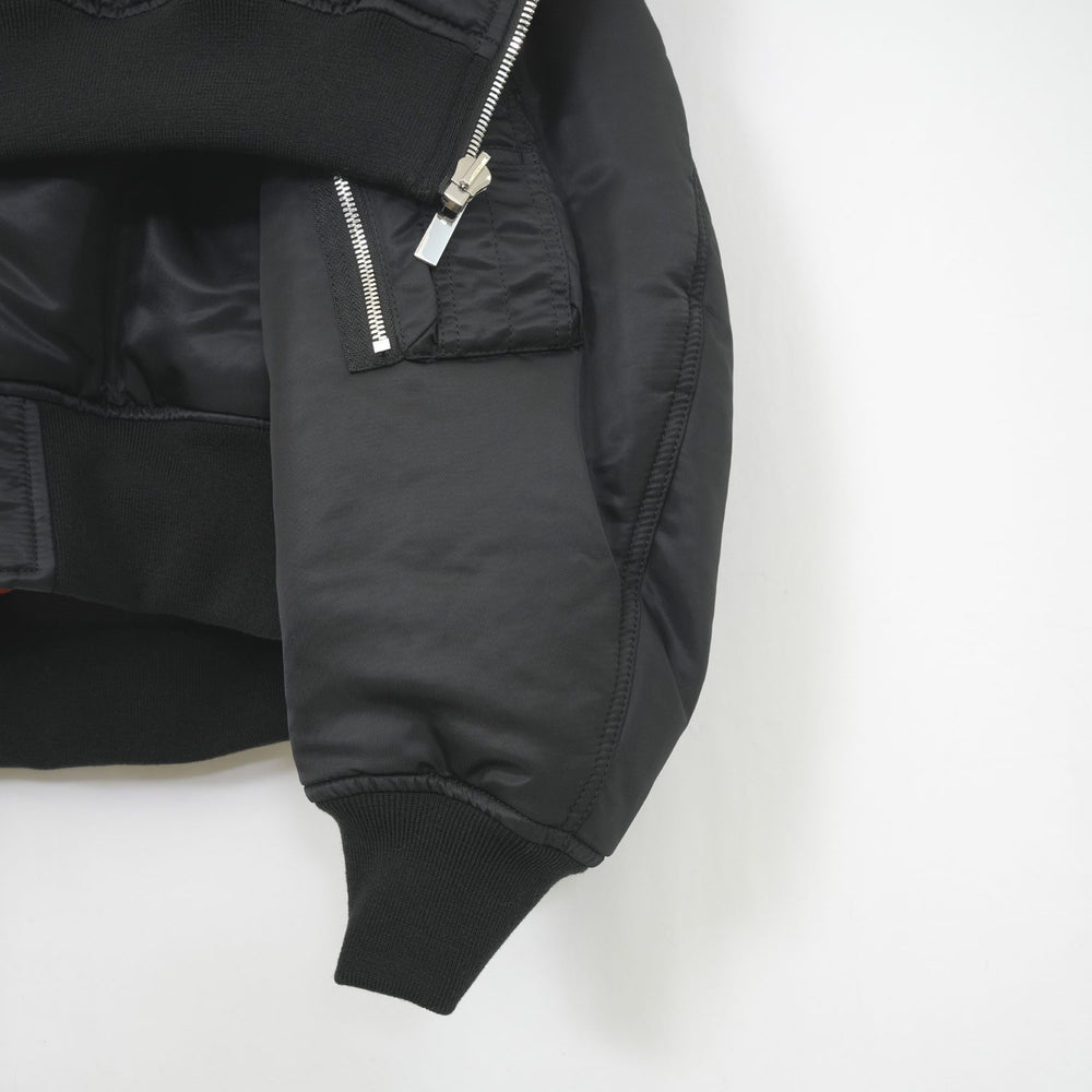 
                  
                    リバーシブルフーディボンバーJK-BLACK-
                  
                