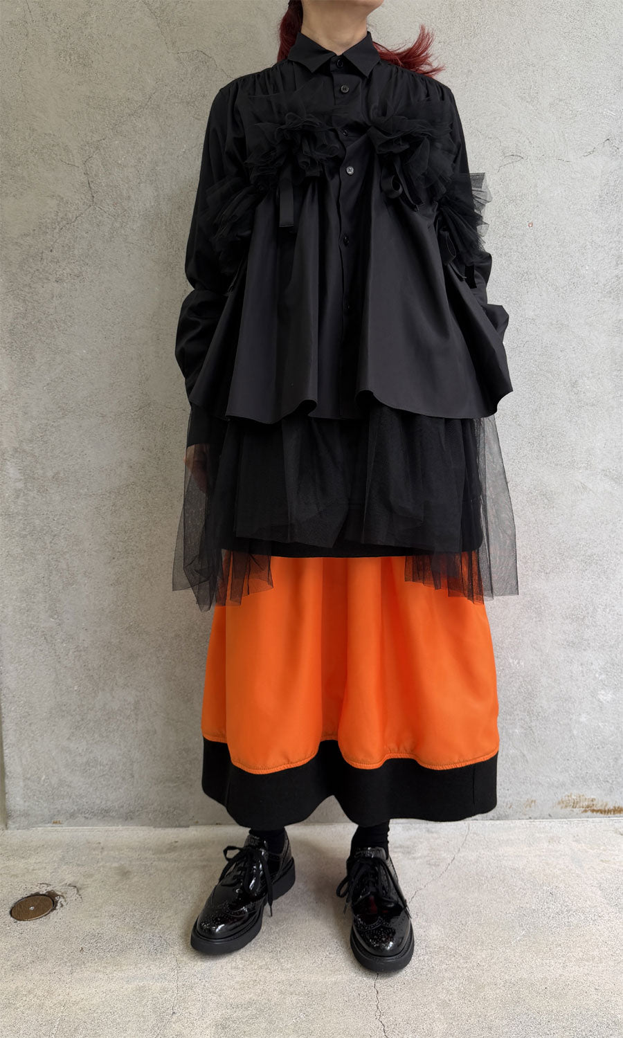 
                  
                    Tulle-docked shirt
                  
                
