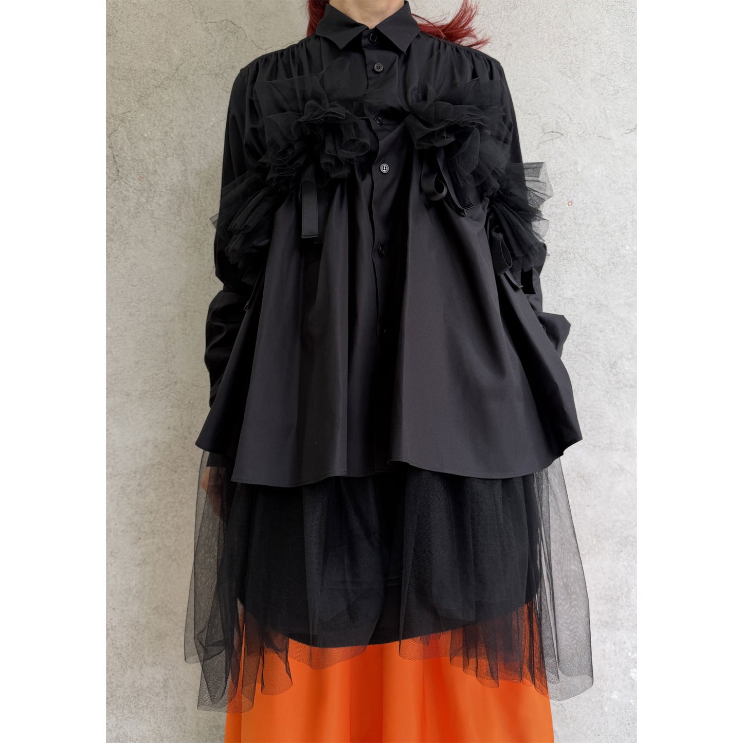 
                  
                    Tulle-docked shirt
                  
                