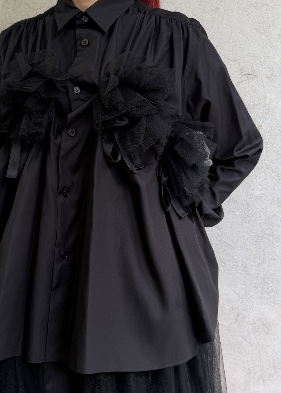 
                  
                    Tulle-docked shirt
                  
                
