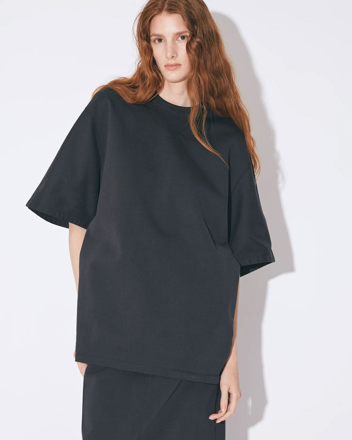 
                  
                    nylon shrink sweat set in dolman top -black-
                  
                