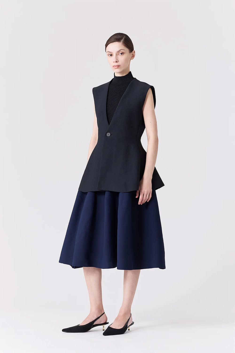 
                  
                    MILAN FLARE VEST
                  
                