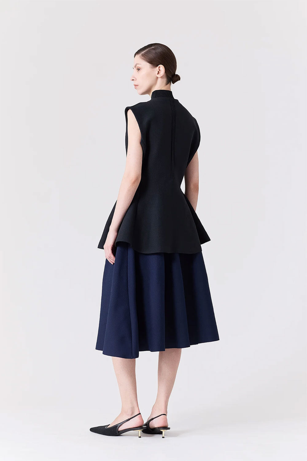 
                  
                    MILAN FLARE VEST
                  
                