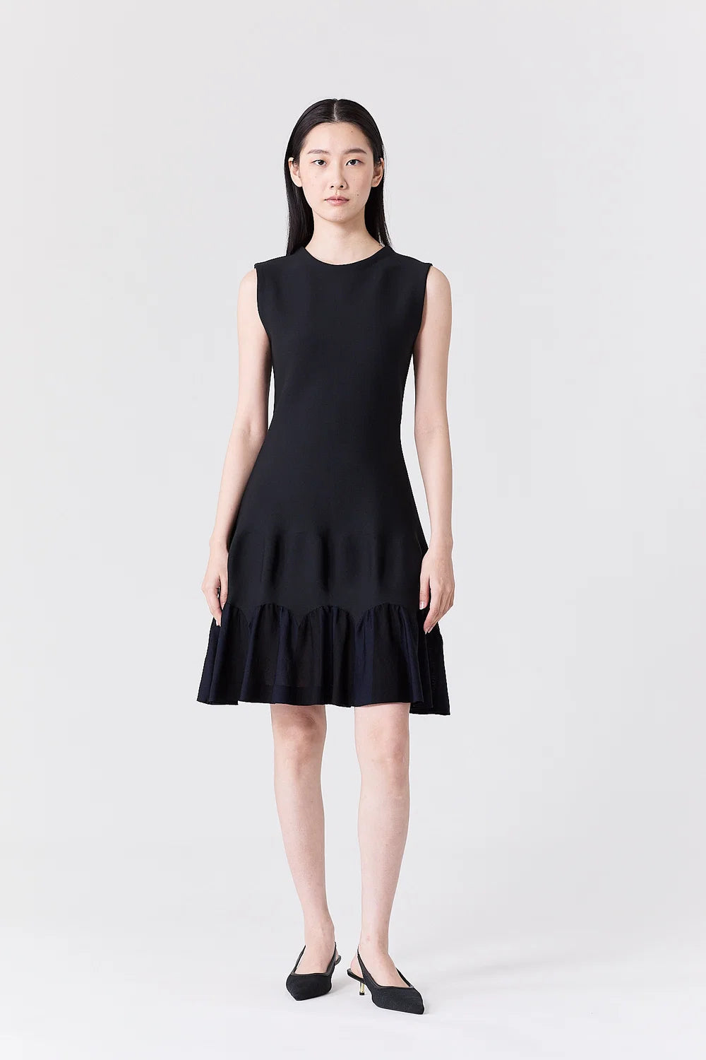 
                  
                    ARCHED SLEEVELESS MINI DRESS
                  
                