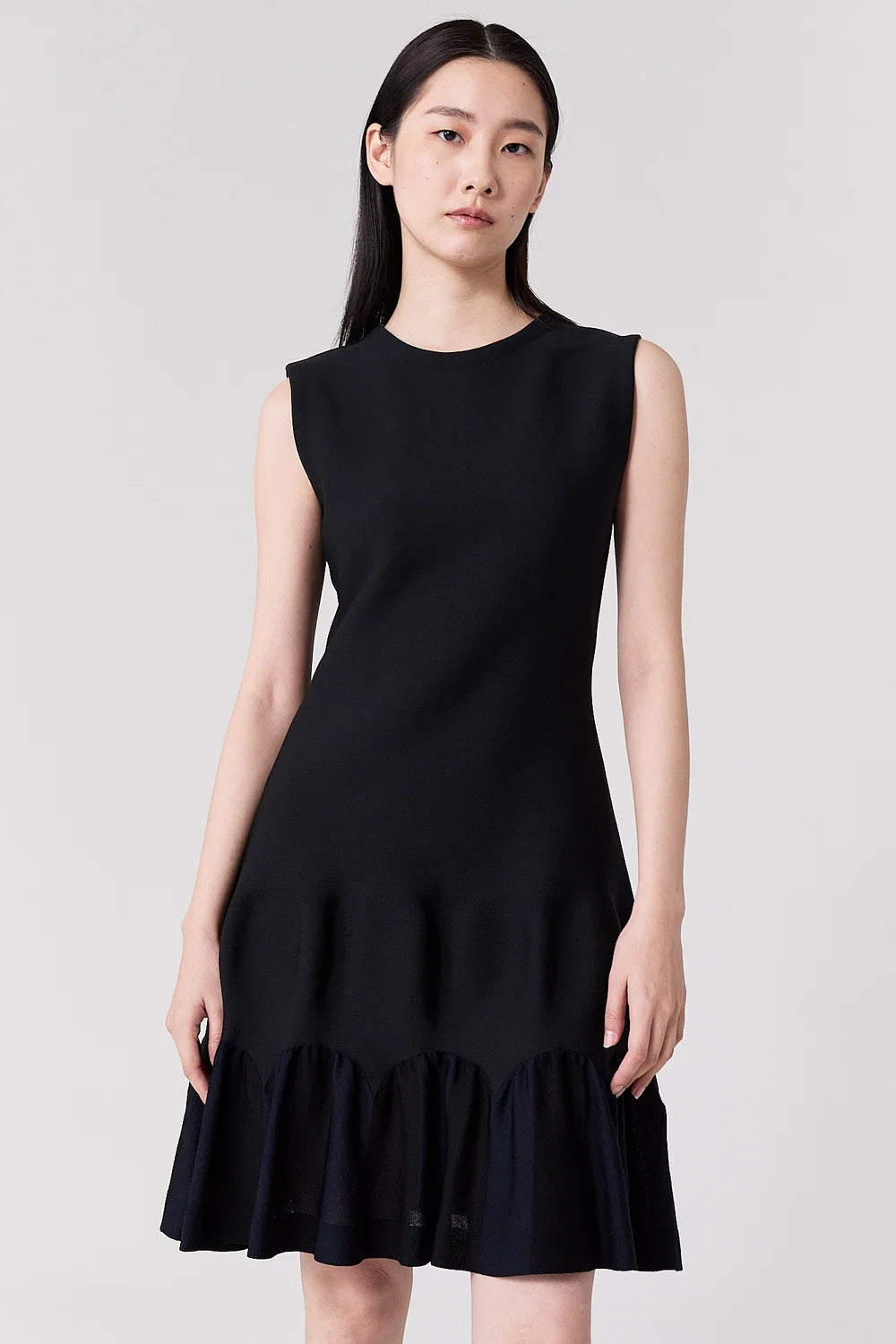 
                  
                    ARCHED SLEEVELESS MINI DRESS
                  
                