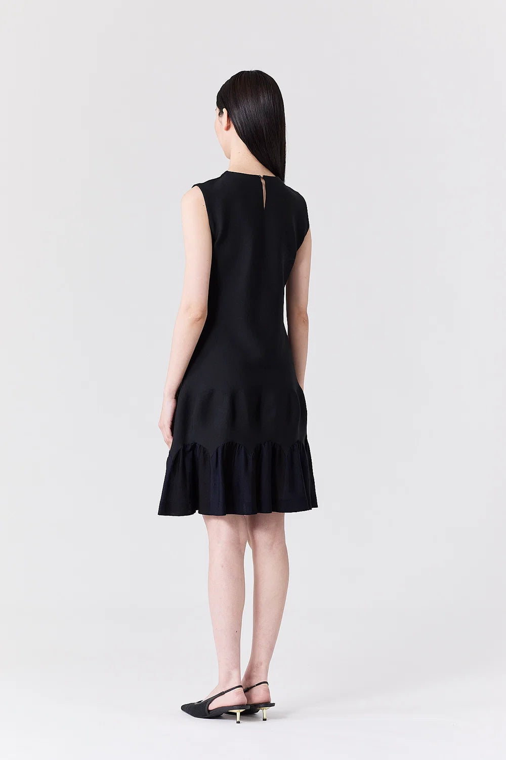 
                  
                    ARCHED SLEEVELESS MINI DRESS
                  
                