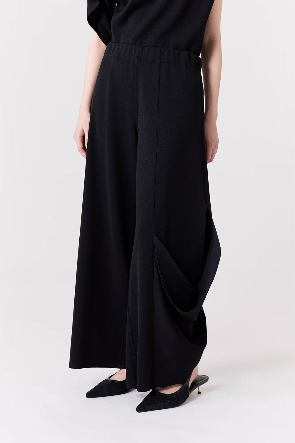 
                  
                    AC MILAN-DRAPED PANTS
                  
                