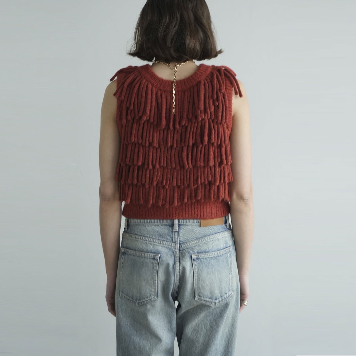 
                  
                    W FACE FRINGE KNIT VEST
                  
                