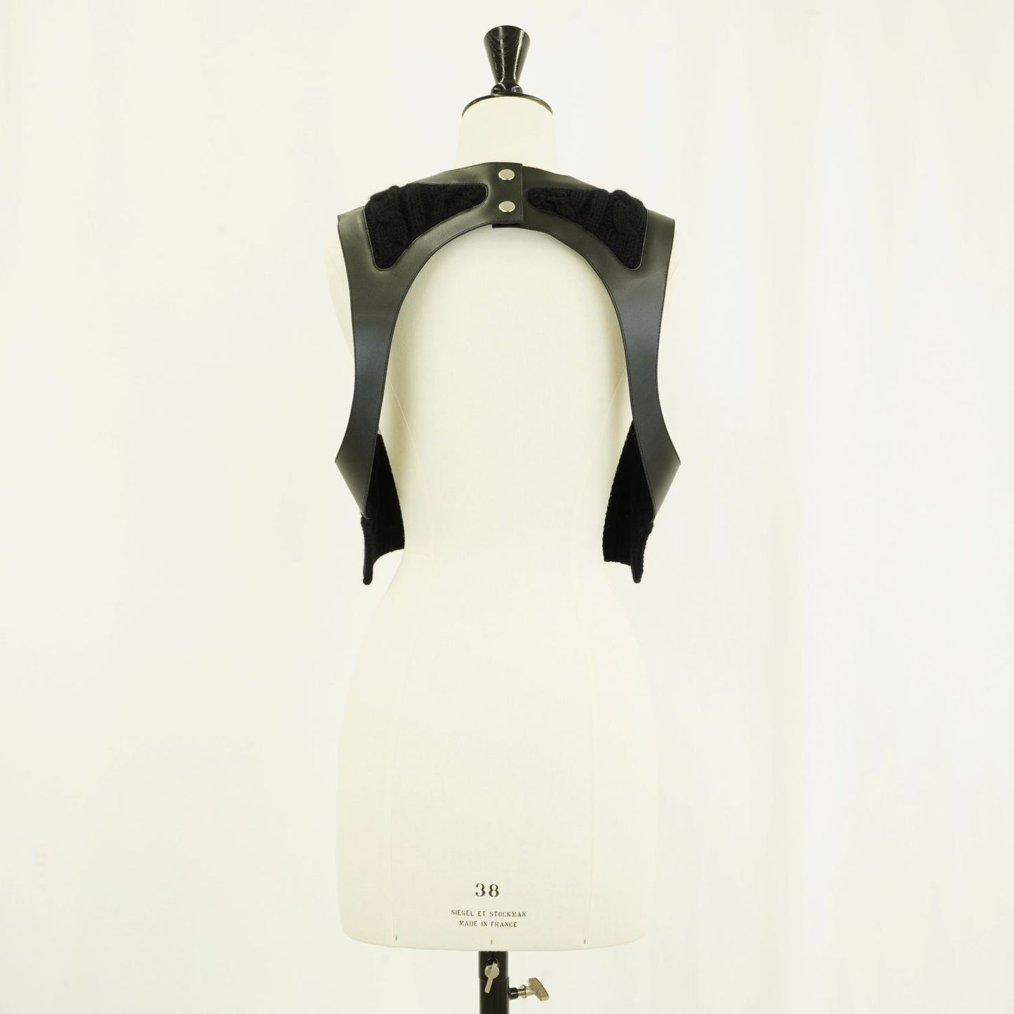 
                  
                    Leather×Knit harness vest
                  
                