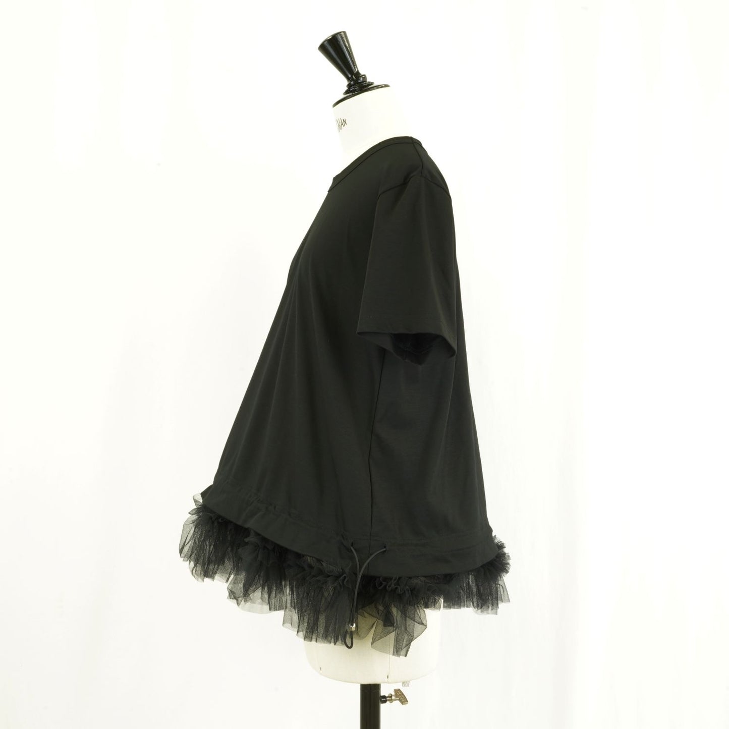 
                  
                    T-shirt with tulle hem
                  
                