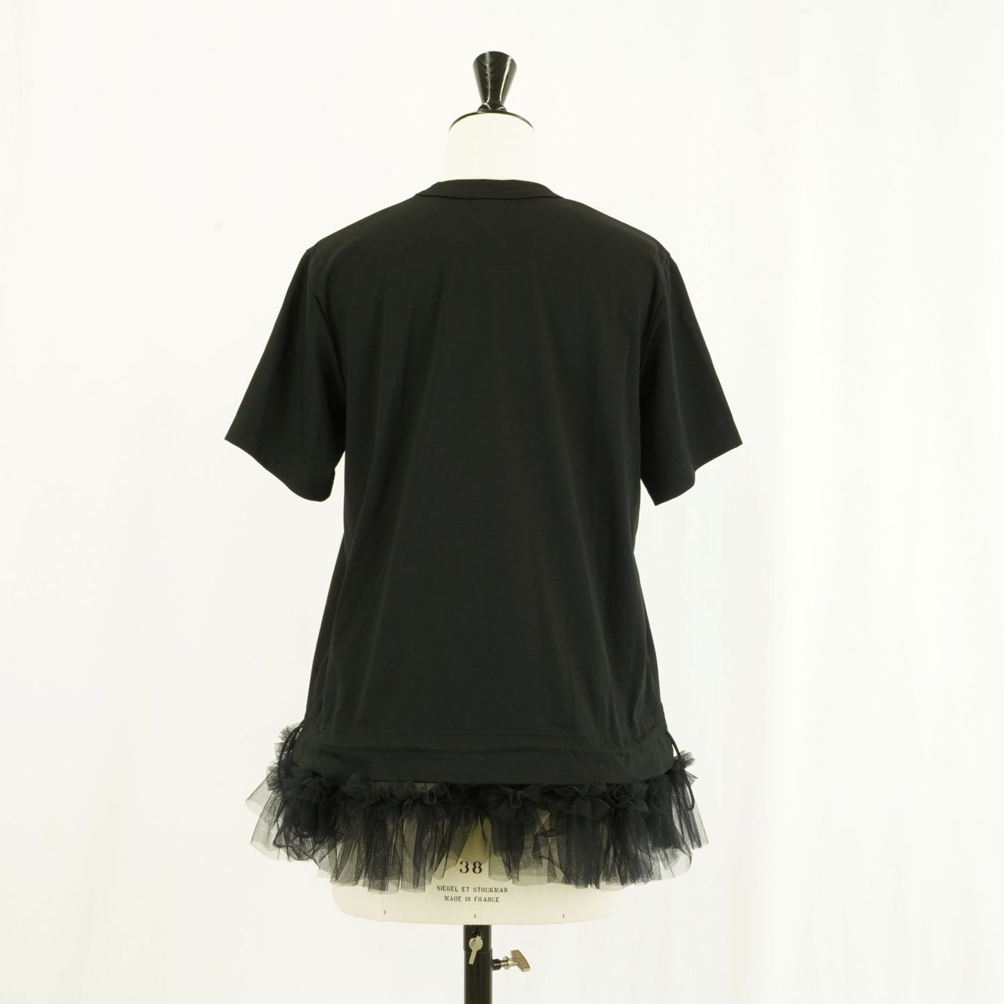 
                  
                    T-shirt with tulle hem
                  
                