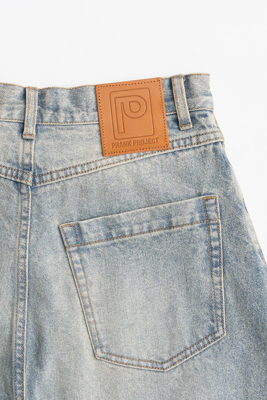 
                  
                    High-waisted Curved Denim
                  
                