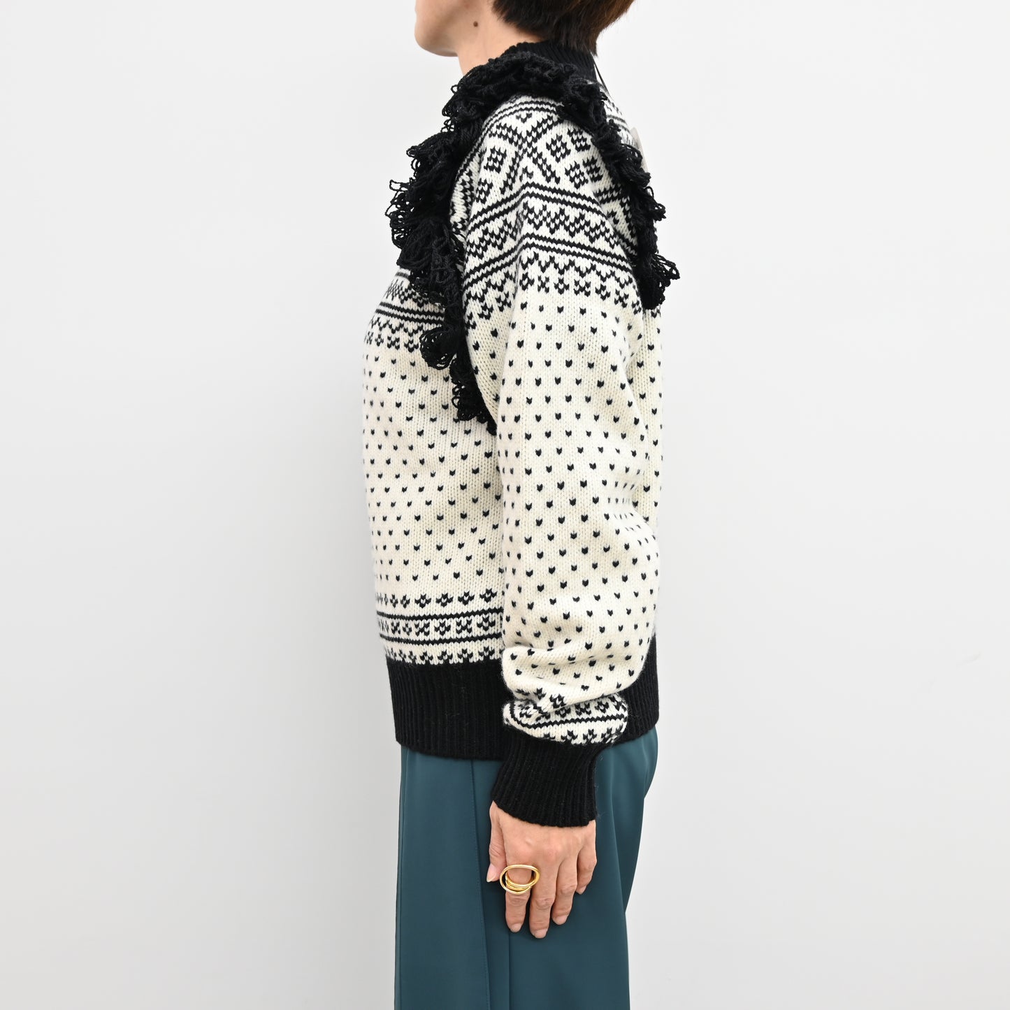 
                  
                    NORDIC FRINGE SWEATER
                  
                