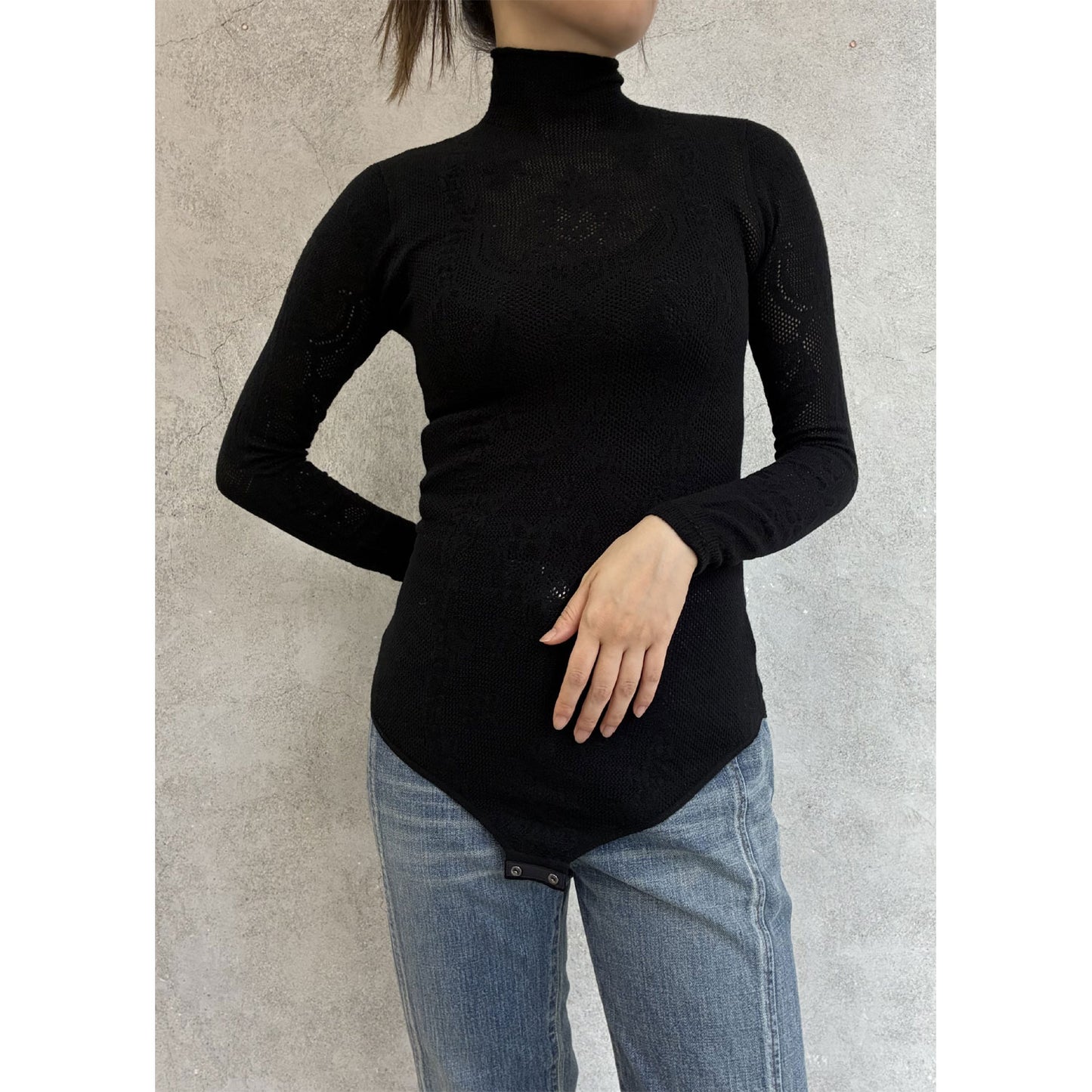 
                  
                    WOOL LACE KNIT TURTLENECK BODYSUIT
                  
                