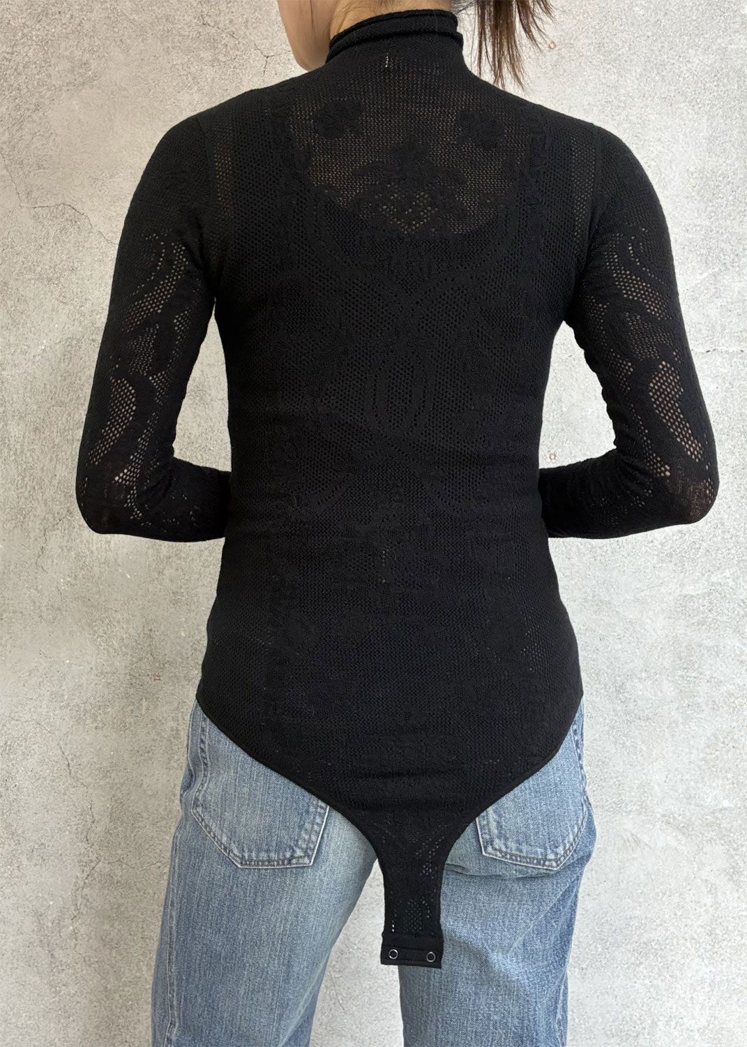 
                  
                    WOOL LACE KNIT TURTLENECK BODYSUIT
                  
                